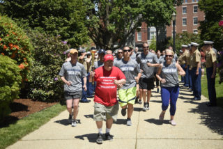 Athlete running with torch