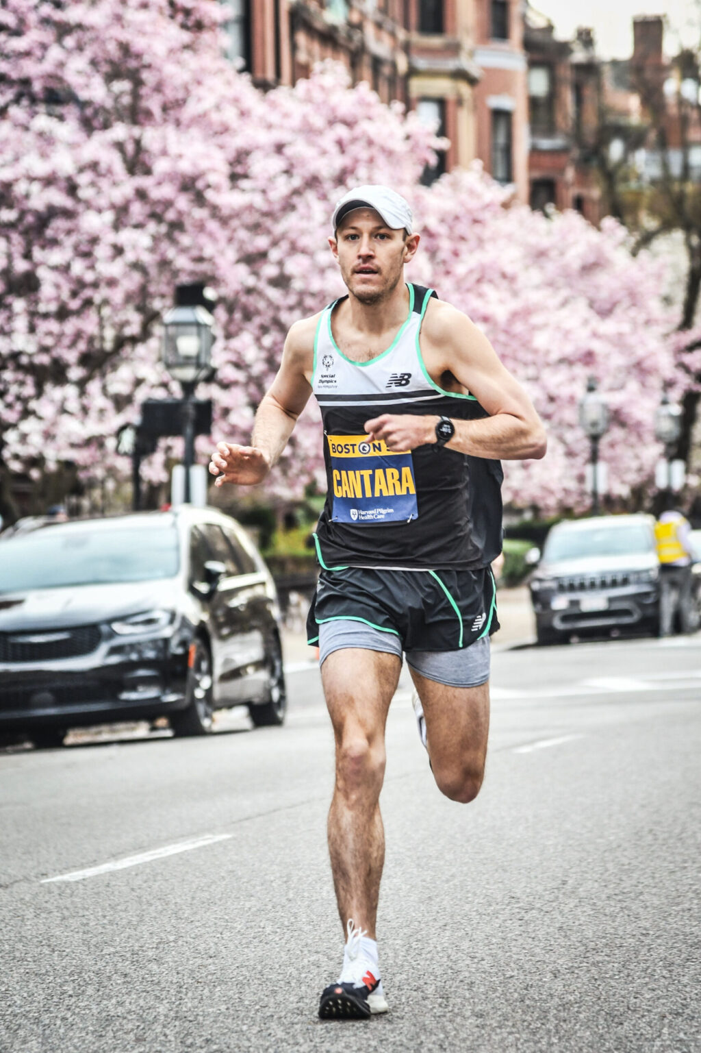 Thomas Cantara running down Boston street